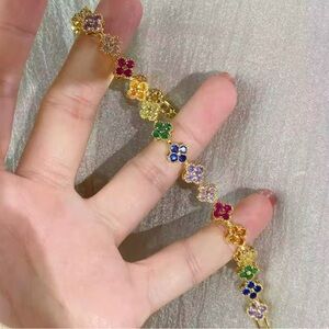 Gold Floral Bracelet with Multicolor Gem Accents